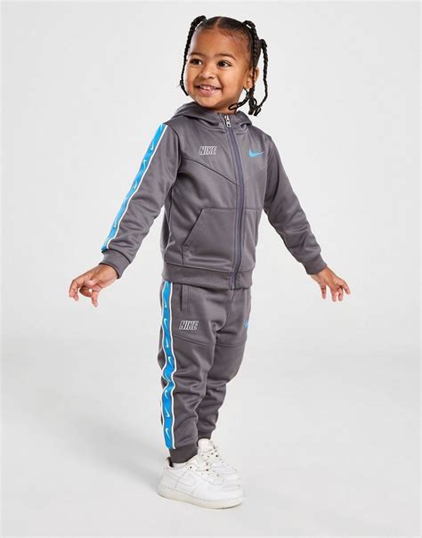 replica nike tracksuits|nike tape poly tracksuit.